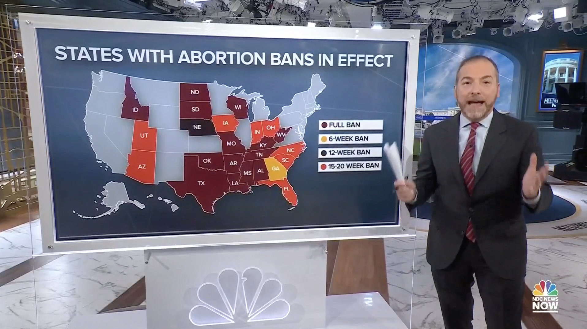 TV host presents data in front of a map on NBC News.